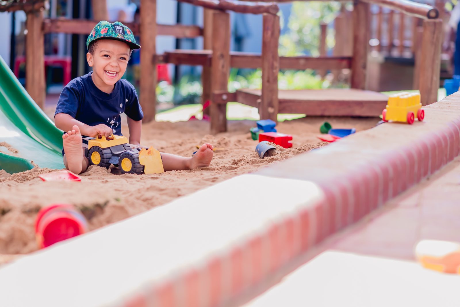 Happy in the sandpit